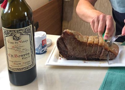 Dry-aged beef rib on the bone with sautéed potatoes