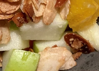 Fruit salad with caramelized almonds